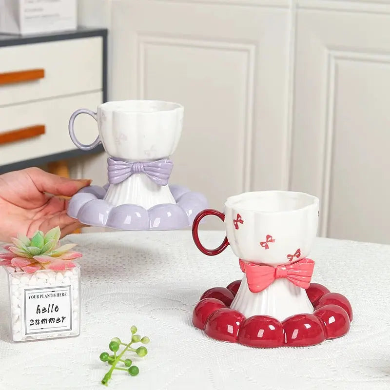 Bow Design Ceramic Tea Cup with Matching Saucer