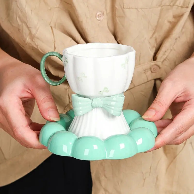 Bow Design Ceramic Tea Cup with Matching Saucer