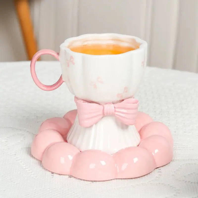 Bow Design Ceramic Tea Cup with Matching Saucer