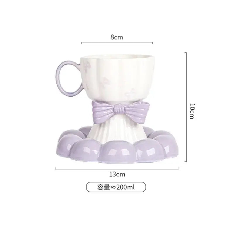 Bow Design Ceramic Tea Cup with Matching Saucer