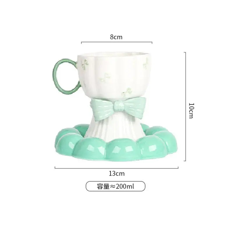 Bow Design Ceramic Tea Cup with Matching Saucer