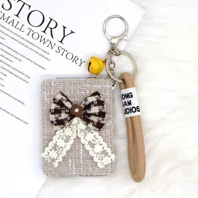 Elegant Bow Compact Mirror Keychain with Wrist Strap